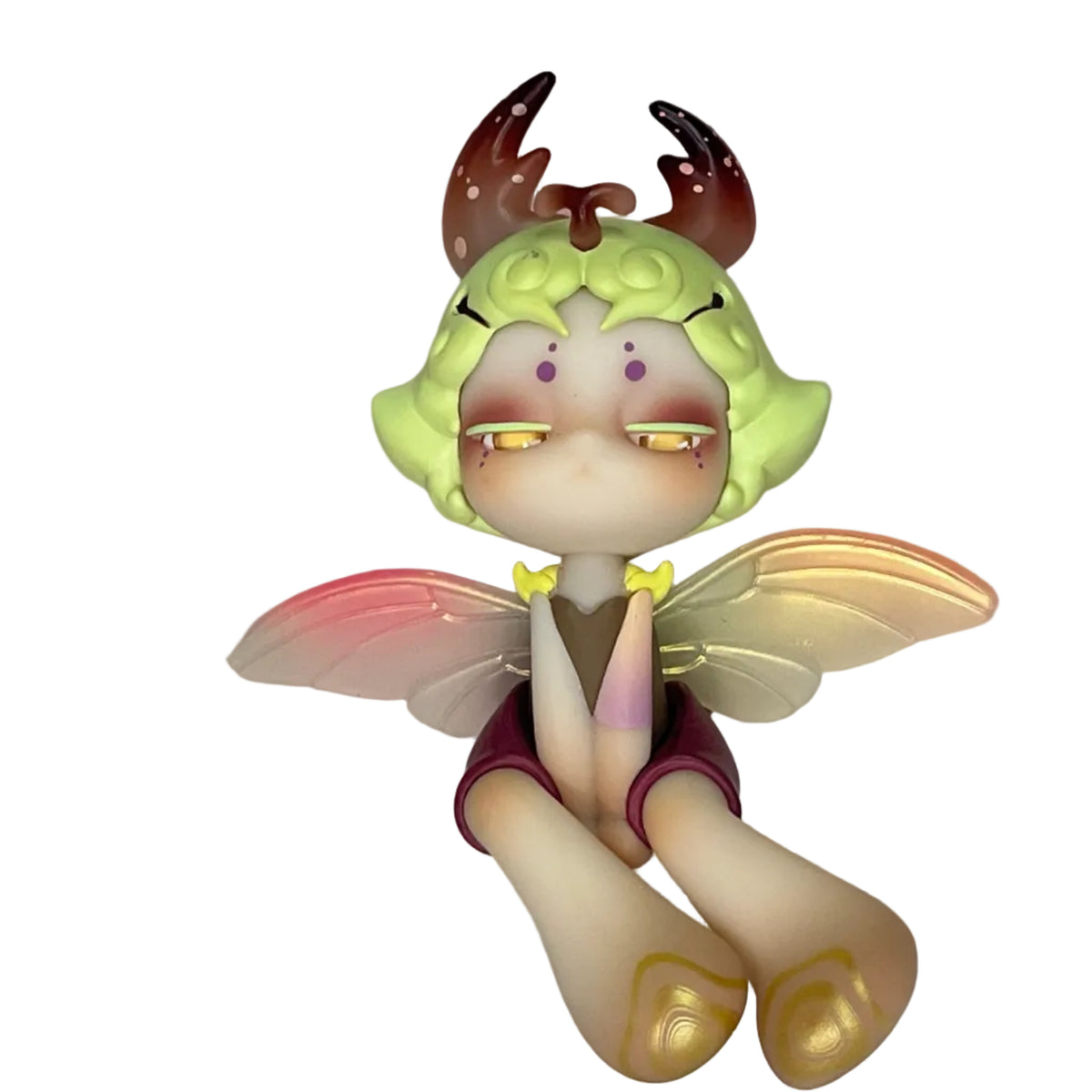 Small figurine with fairy-like design on a pink and white background, featuring the brand 'Rock with Jenny'.
